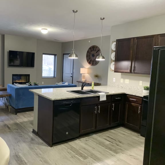 Thumbnail 3 of 19 Kitchen and dining area in a Harper three bedroom floor plan apartment at North Point Villas in Lincoln Ne