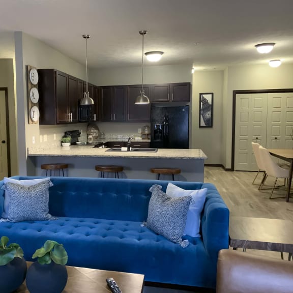 Thumbnail 5 of 19 Living space with view of kitchen at North Point Villas