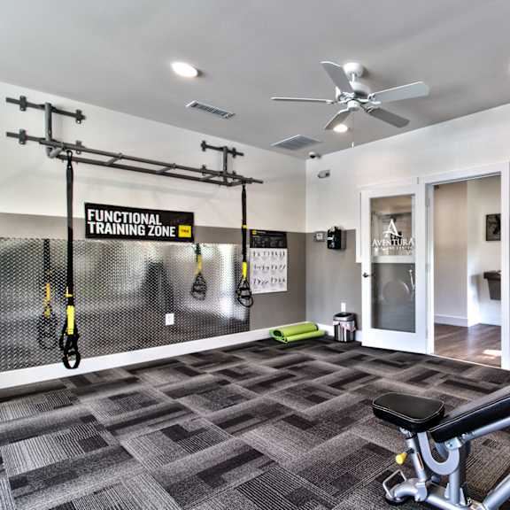 fitness center with equipment at aventura at towne centre, missouri