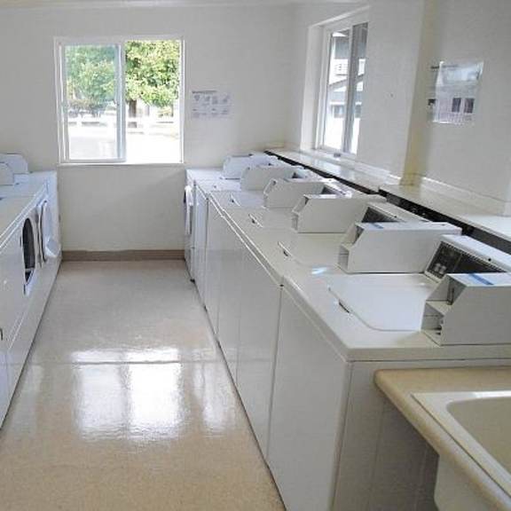 laundry facility with washers and dryers
