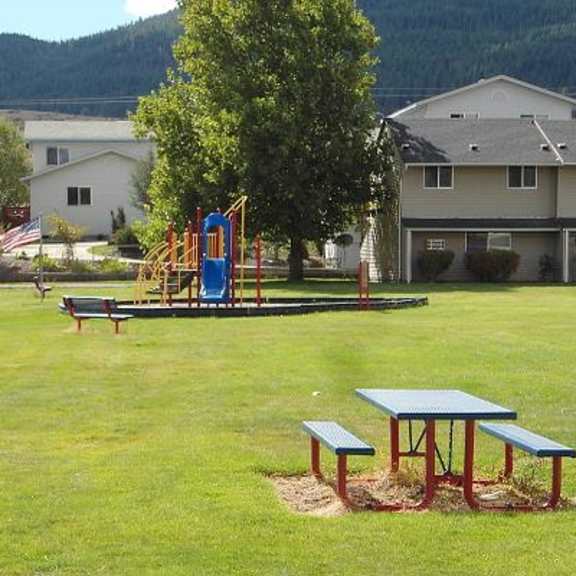 picnic table and playground equipment