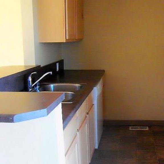 kitchen with fridge, range, and microwave