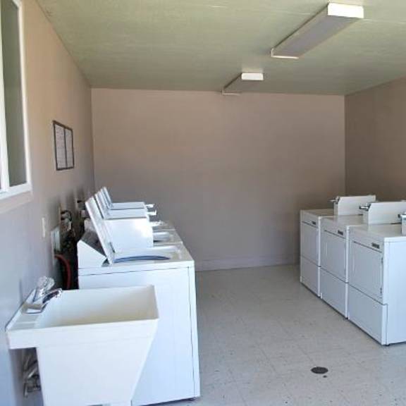 laundry facility with washers and dryers