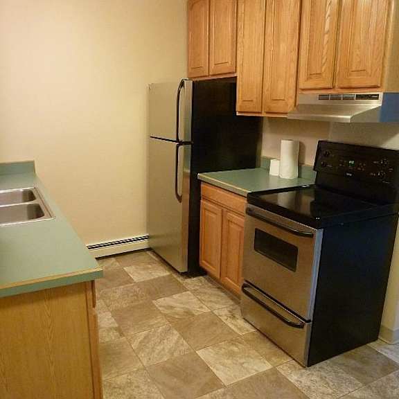 kitchen with fridge and range