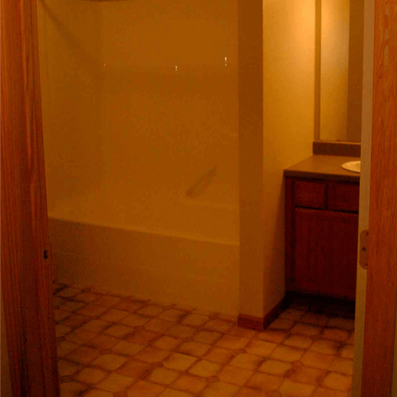 hued view of bathroom at archway