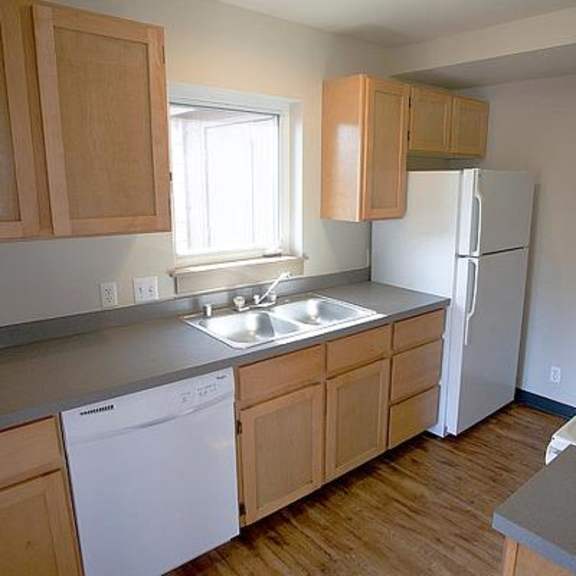 kitchen with fridge range and dishwasher