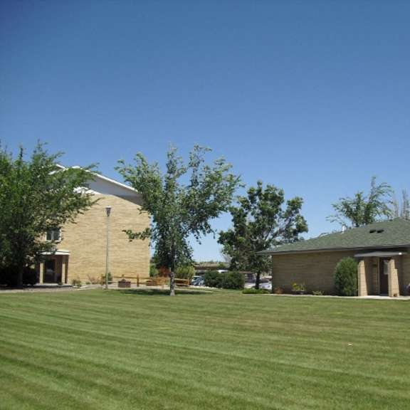 view of buildings and lawn