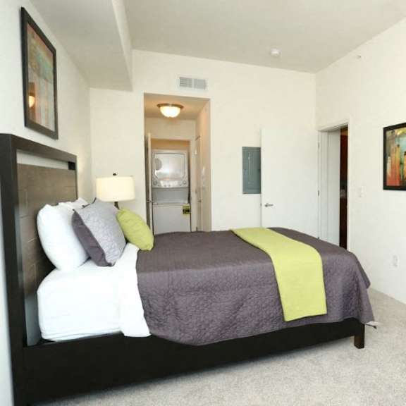 large bedrooms with comfortable bed  at brooks apartments, michigan, 48642