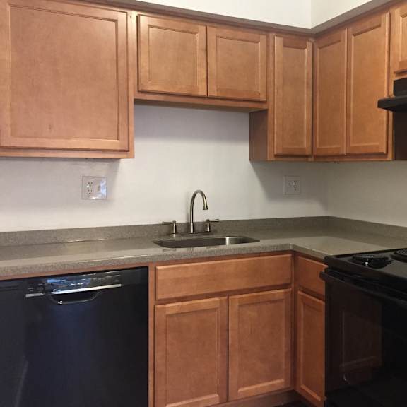 updated kitchens with black appliances at walnut creek townhomes, cincinnati, oh