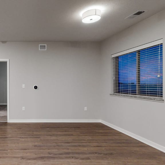 Thumbnail 5 of 28 The 2 bedroom Hibiscus floor plan at WH Flats features natural light and a spacious living and dining area.