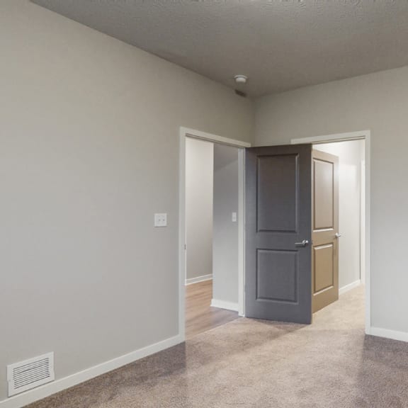 Thumbnail 24 of 28 The bedrooms in the Hibiscus floor plan feature spacious walk-in closets.