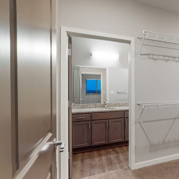 Thumbnail 25 of 28 The master bedroom in the Hibiscus floor plan features a spacious walk-in closet.