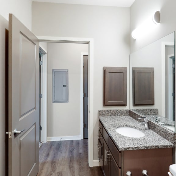 Thumbnail 11 of 19 The 2 bedroom Marigold with den floor plan features 2 spacious bathrooms with abundant storage.