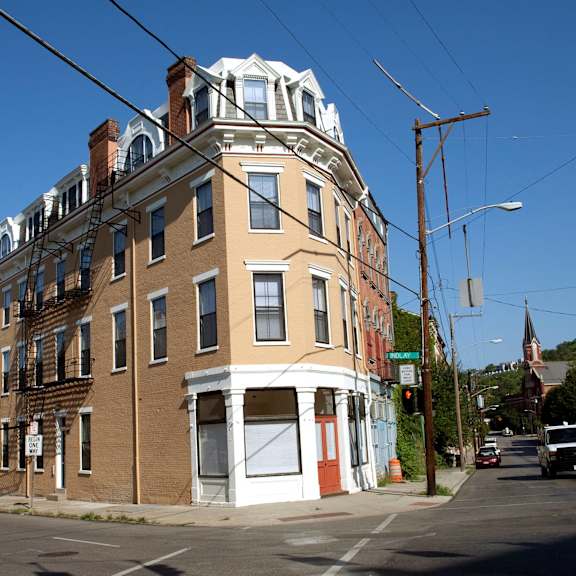 exterior of apartment building on street corner