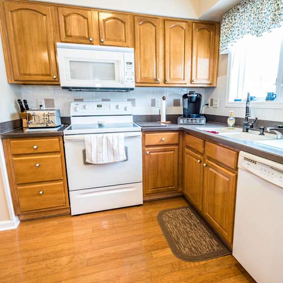 pine grove estates – kitchen - dining – appliances – breakfast bar - 24 hour emergency maintenance – dishwasher - storage - 55+ community - ask for a tour - pet friendly
