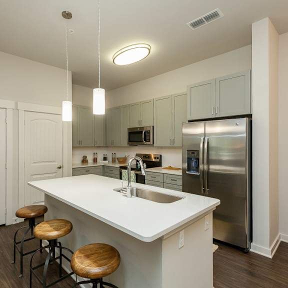 kitchen with granite countertops and stainless steel appliances at proximity apartments, south carolina, 29414