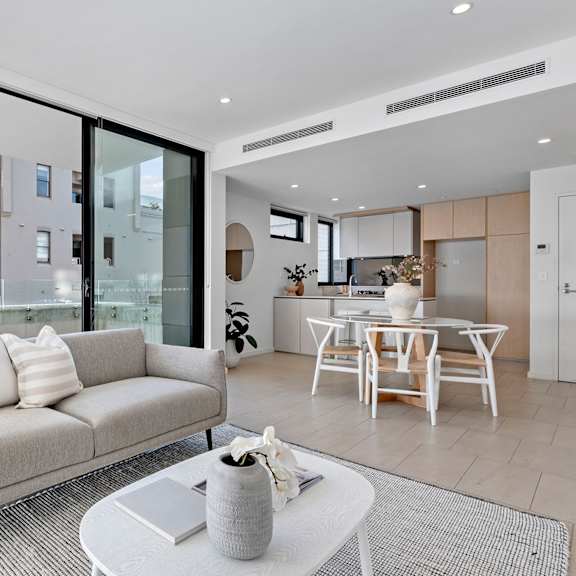 a living room with a couch and a table