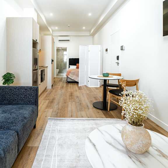 a living room with a couch and a coffee table