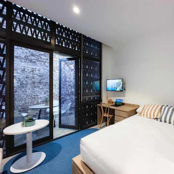 a bed or beds in a room at a hotel