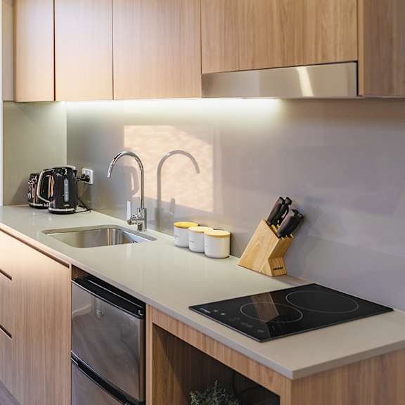 a kitchen with a sink and a window