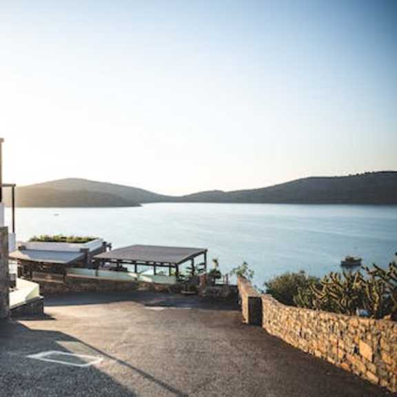 a house that is sitting next to a body of water