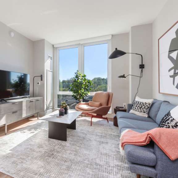 a living room with a couch and a coffee table