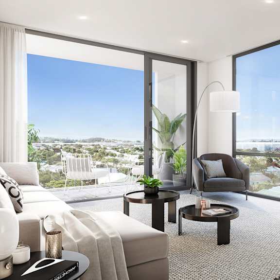 a living room with a view of the city and a couch and chairs