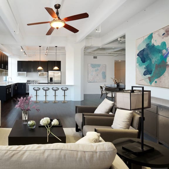 a living room with couches and a coffee table