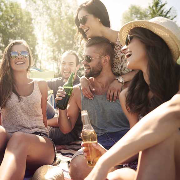 a group of friends enjoying a sunny day outdoors.