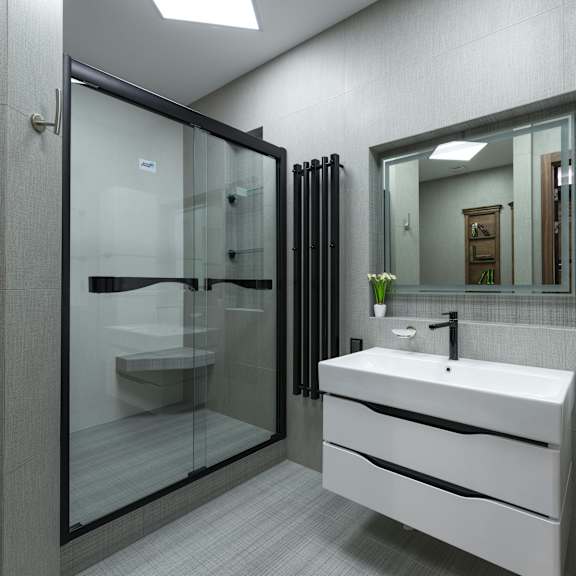 a modern bathroom with a white sink and a glass shower.