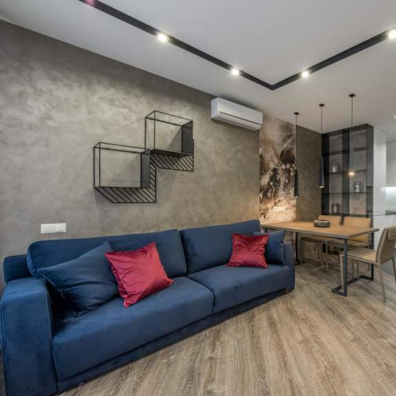 a living room with a couch and a table
