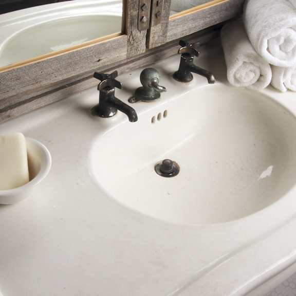 bathroom sink and towels