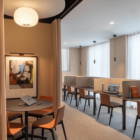 a room with a table and chairs and a painting on the wall. at cherrywood apartments, d18 vy3v