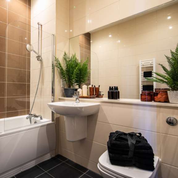 Thumbnail 5 of 8 a bathroom with a sink toilet and bath tub at The Keel Apartments, Liverpool, L3 4GE