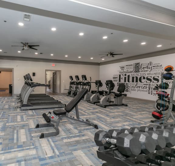 Spacious Gym with Equipment at The Mill at Chastain Apartments in Kennesaw, GA 30144