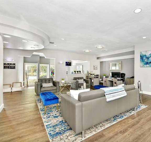 a living room with couches and a coffee table