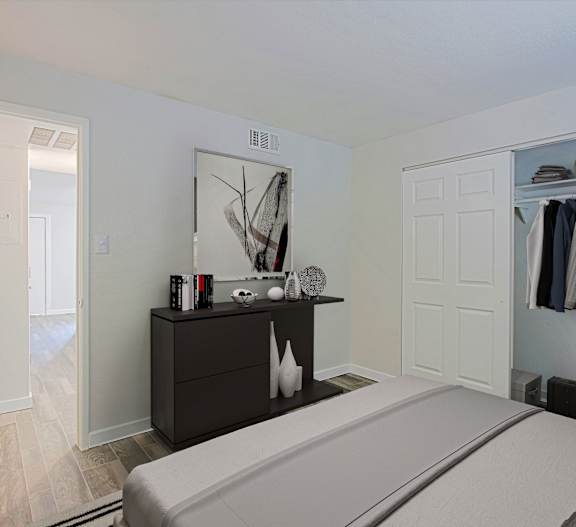 Bedroom with a dresser and a closet at Aspire Mesa, Mesa, 85210.
