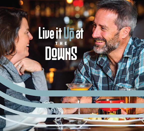 A man and a woman are having a meal together.