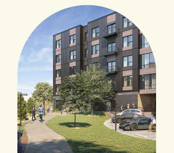 A modern apartment building with a green lawn in front and people walking around.at The Park Apartments, Cleveland , OH