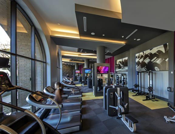 A gym with treadmills, weights and exercise machines. at West Park Apartments, San Diego, CA, 92108