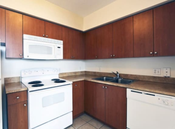 Kitchen at Poinciana Grove Senior Apartments in Miami FL