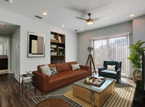 a living room with a couch and a chair