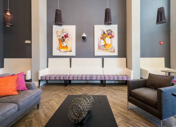 a living room with couches and a coffee table at Linden on the GreeneWay, Florida, 32824