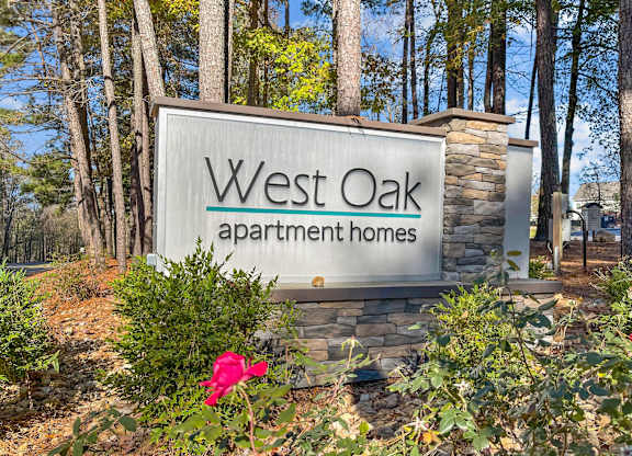 A sign for property name at West Oak Apartments, Wake Forest, North Carolina