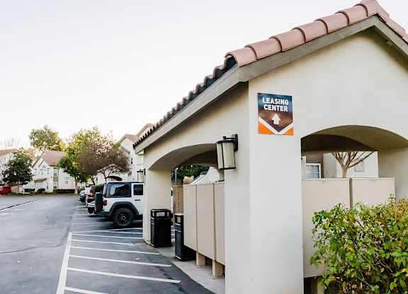 A leasing center with a parking lot in front. at Legends at Rancho Belago, Moreno Valley, CA, 92553