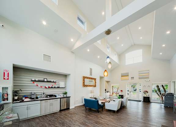 A spacious kitchen with a dining area and a living room. at Legends at Rancho Belago, Moreno Valley, CA, 92553