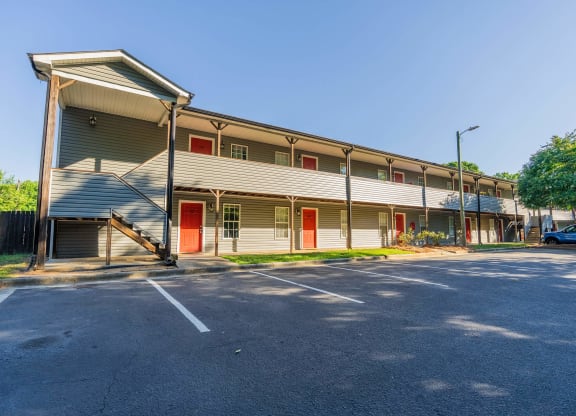 the building where the motel is located has a parking lot at Ashford Place Apartments, Kannapolis, NC 