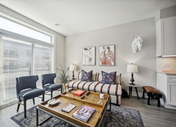 a living room with a couch and a coffee table at Park Kennedy, Washington