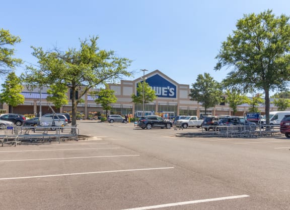 a shopping center with a parking lot in front of it at Fairmont at South Lake, Maryland