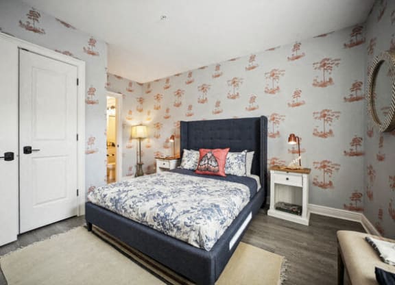 a bedroom with a bed and a white door at Park Kennedy, Washington, DC